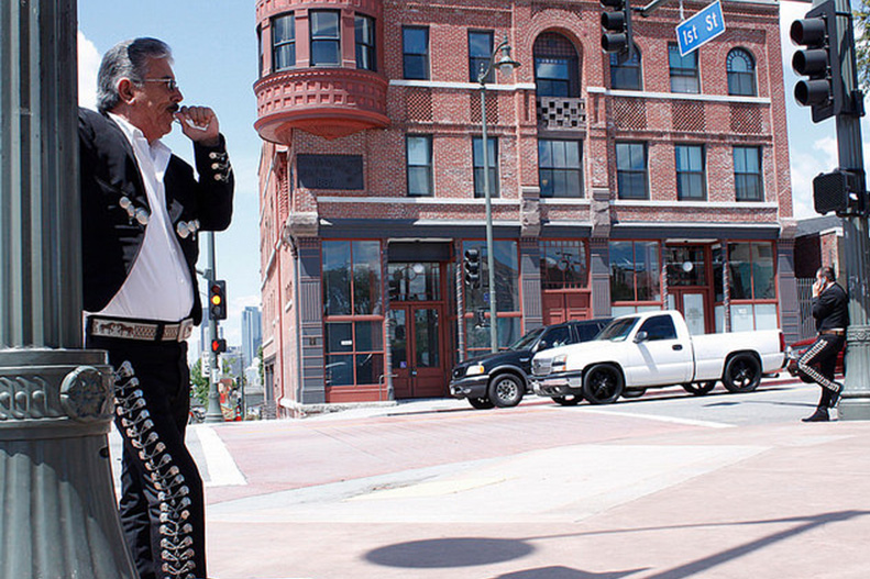 Musician Teodoro Cuevas waits for business in LA’s Mariachi Plaza. Photo by Emmanuel Martinez/Neon Tommy.
